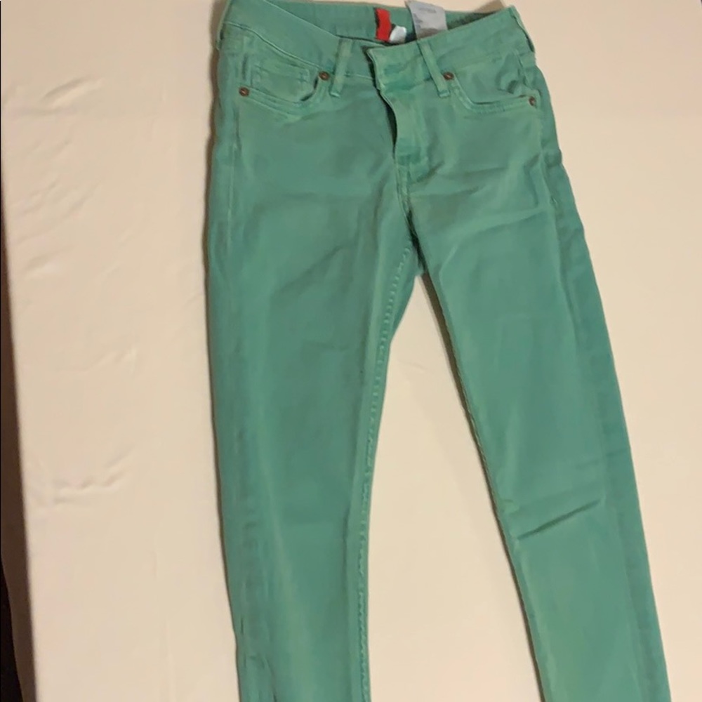 Green skinny jeans